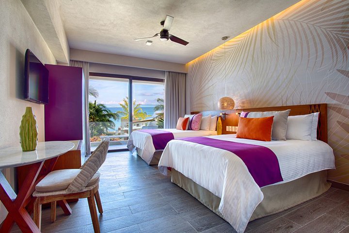 Img - Suite Bahía de 2 dormitorios vista parcial al mar