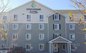 ? HotelDetail_LogoAlt WoodSpring Suites Charleston Ashley Phosphate logo