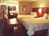 ? HotelDetail_LogoAlt Extenda Suites Mobile North logo