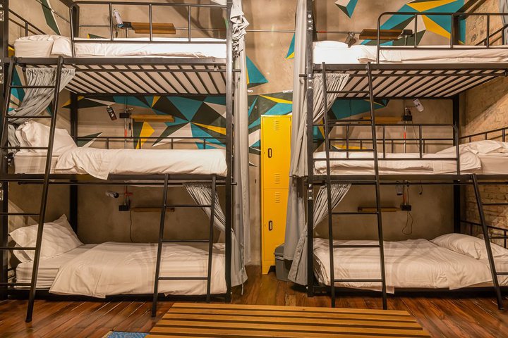 Img - Cama en dormitorio comunitario de 12 camas
