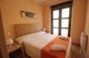 ? HotelDetail_LogoAlt Km1 Tirso de Molina Apartments logo