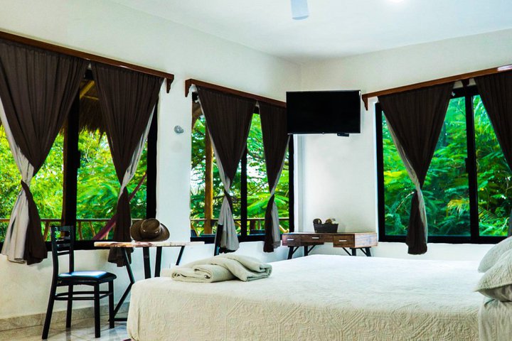 Img - Suite terraza con vista parcial a la laguna