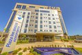 ? HotelDetail_LogoAlt Plaza Inn Breeze Aeroporto logo