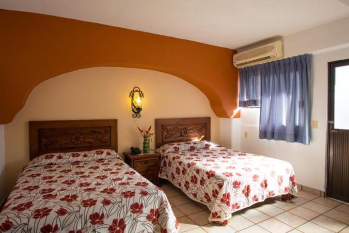 Img - Habitación estándar, 2 camas dobles, vistas al mar